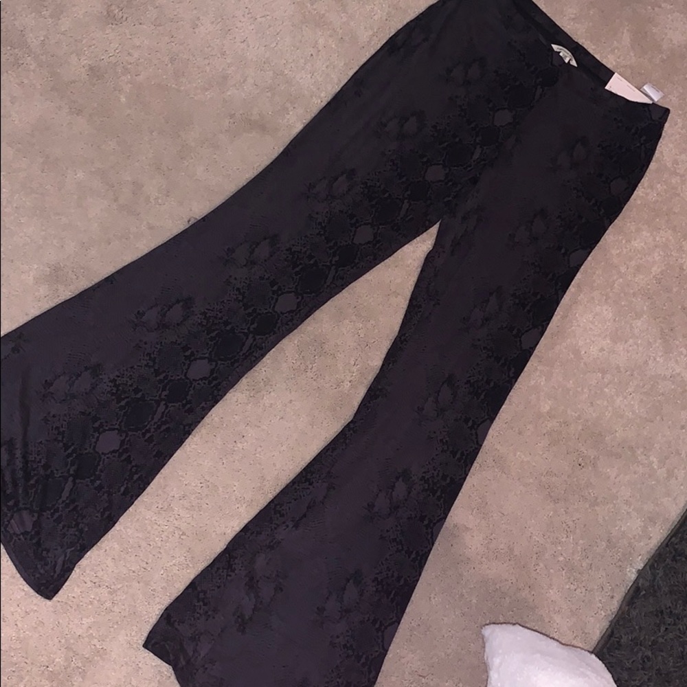 Snake skin bell bottom leggings